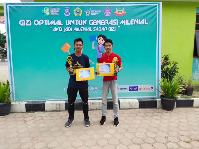 DOSEN dan MAHASISWA PENJAS FKIP UNIMUDA RAIH DUA PIALA, DALAM AJANG LOMBA PERINGATAN HARI GIZI NASIONAL KE - 60 DI POLTEKKES SORONG